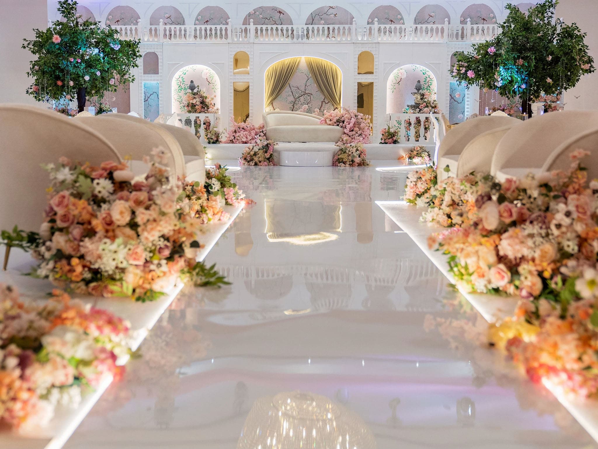 Luxury wedding setting with flowers, glass and soft light